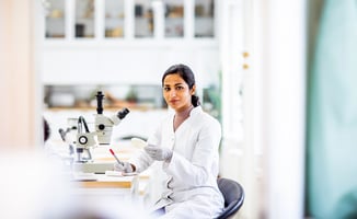 researcher using Lab tools