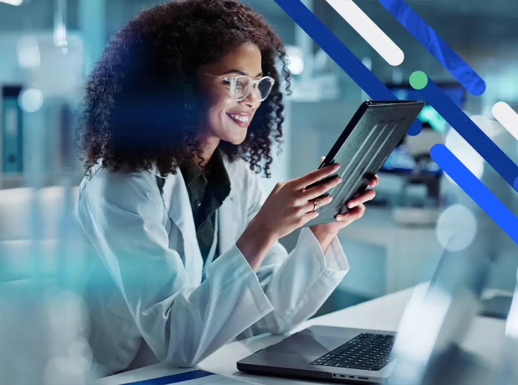 lab technician looking at a tablet